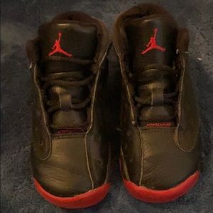 Black and red Jordan’s toddler 8c